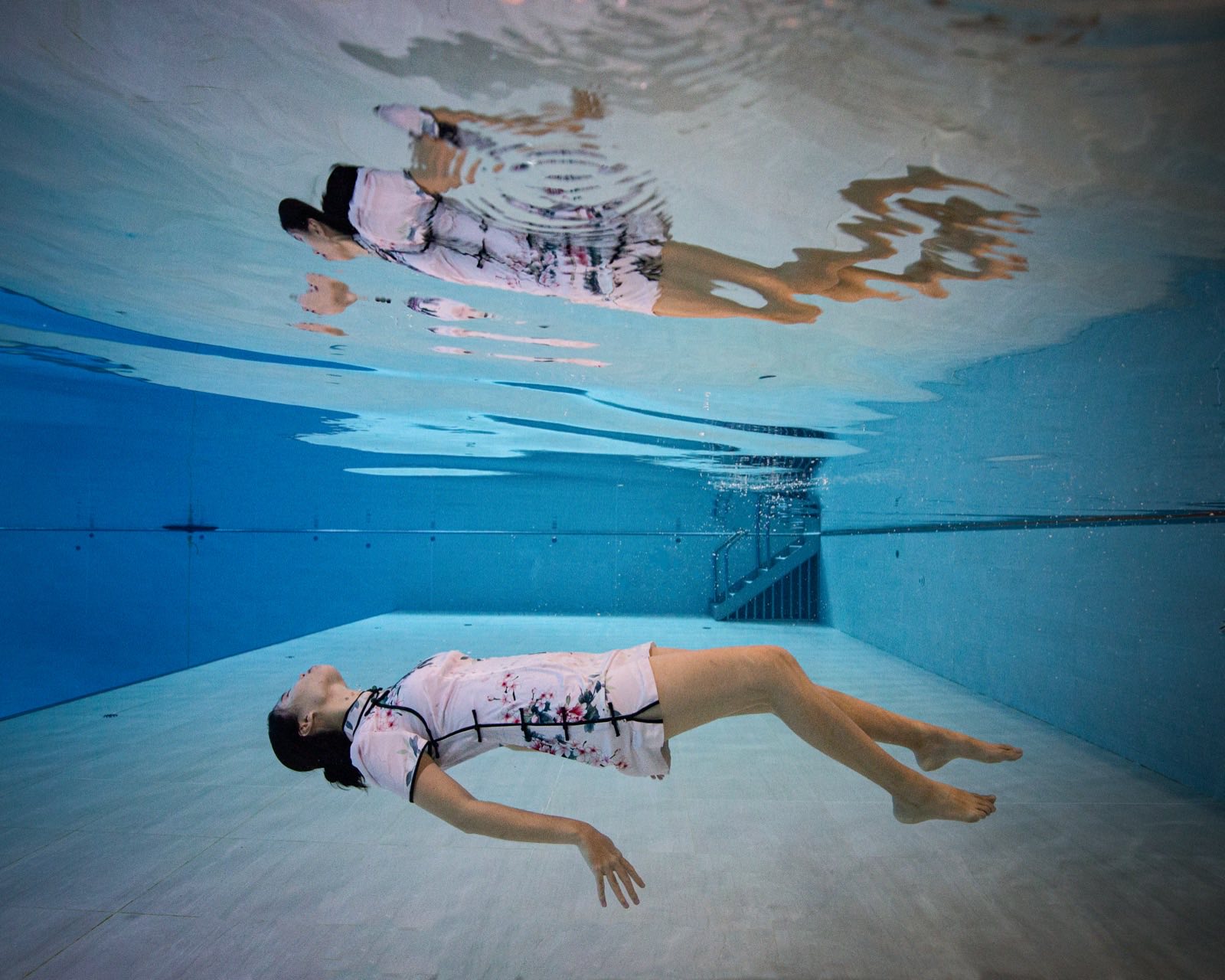 Freediving and mermaid photography in an indoor pool