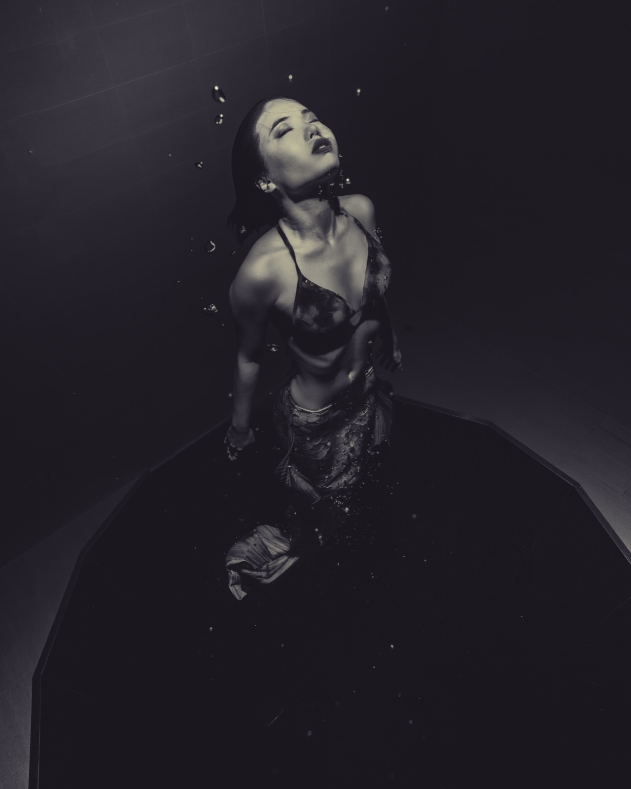 Freediving and mermaid photography in an indoor pool