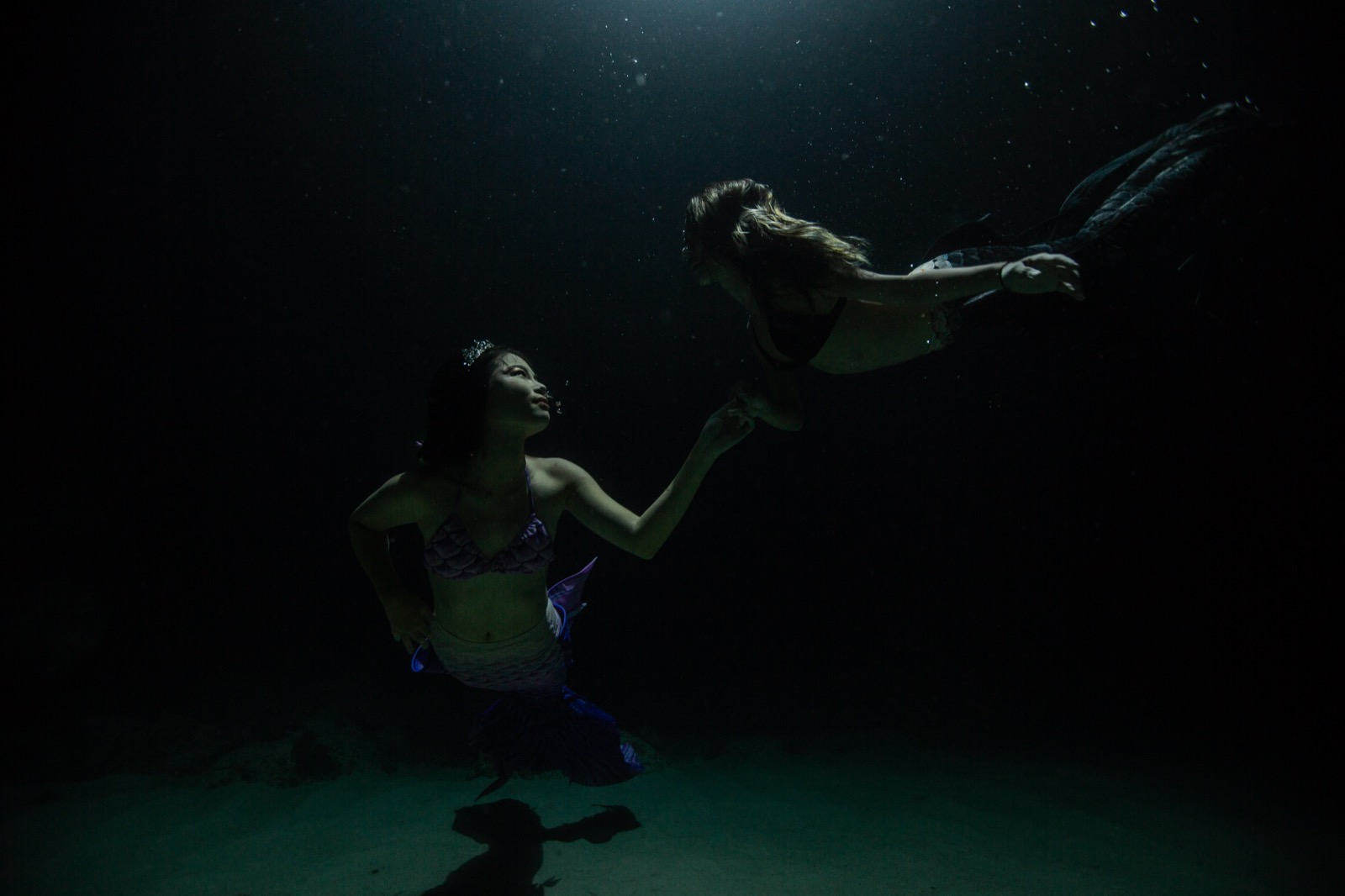 Freediving and mermaid photography in an indoor pool