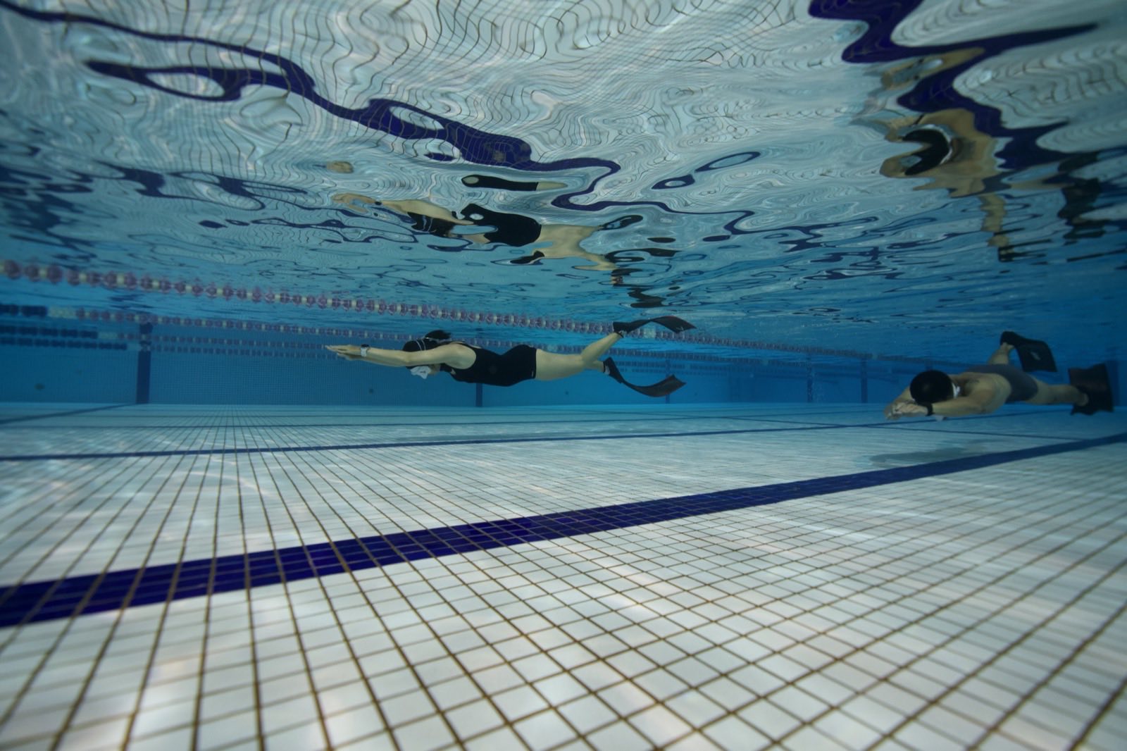 Freediving and mermaid photography in an indoor pool